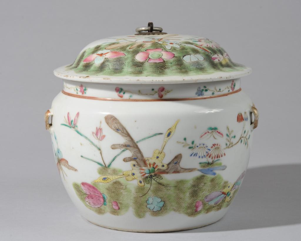 Chinese Famille Rose Vessel & Cover: Round vessel decorated with butterflies and flowers in famille rose enamels, with a bold black and white design of swallows above a strange round body of water with fish and lotus on one side. Lid wit