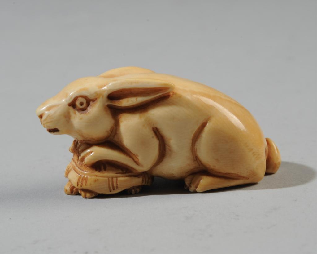 A Rabbit and Tortoise Netsuke: Approx. 2" L.