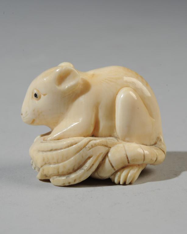 A Mouse with Fruit Netsuke: Signed. Approx. 1 1/2" L.