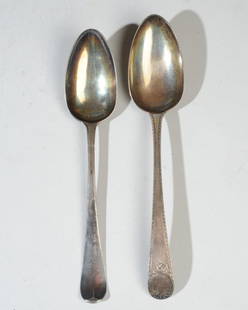 Two 18th C. Sterling Silver Hester Bateman Spoons: Two sterling silver spoons marked for English silversmith Hester Bateman (1709-1794), one with faded marks, one dated 1780 and one dated 1781.Longest: approx. 8 1/2".Total weight: approx. 3.89 ozt.