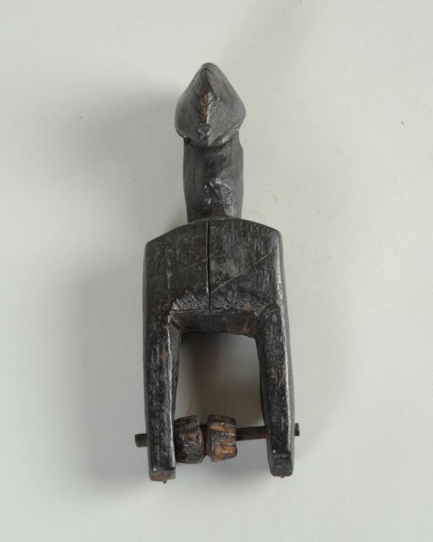 African Heddle Pulley: With cockerel crest. Approx. 8" H. Provenance: Estate of Thomas McNemar, (1931-2020.) McNemar lived and collected throughout Central and West Africa in the 1960s and 70s. He established galleries of A