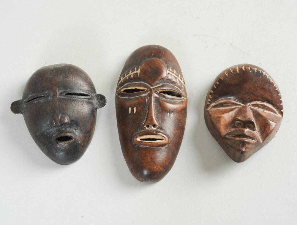 Three Miniature / Passport Masks: Largest, approx. 5 1/2" x 2 3/4". Provenance: Estate of Thomas McNemar, (1931-2020.) McNemar lived and collected throughout Central and West Africa in the 1960s and 70s. He established galleries of Af