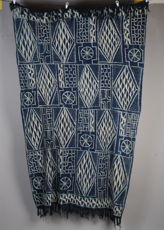 West African Indigo Resist Dyed Textile, Cameroon: Bamileke Ndop cloth, Mali. Resist dyed homespun fabric in soft, somewhat coarse weave, with fringe. Approx. 94" x 52". Provenance: Estate of Cayce Odom of Charlottesville, VA. Acquired in the 1970s by