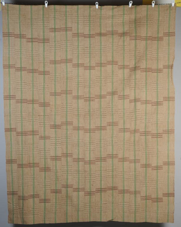 Yoruba Aso Oke Textile, Nigeria: Homespun cotton strip weave fabric with variegated tan ground, brown and green large scale plaid stripes and with openwork. Aso Oke fabrics are used for special occasion and formal clothing. Approx. 6