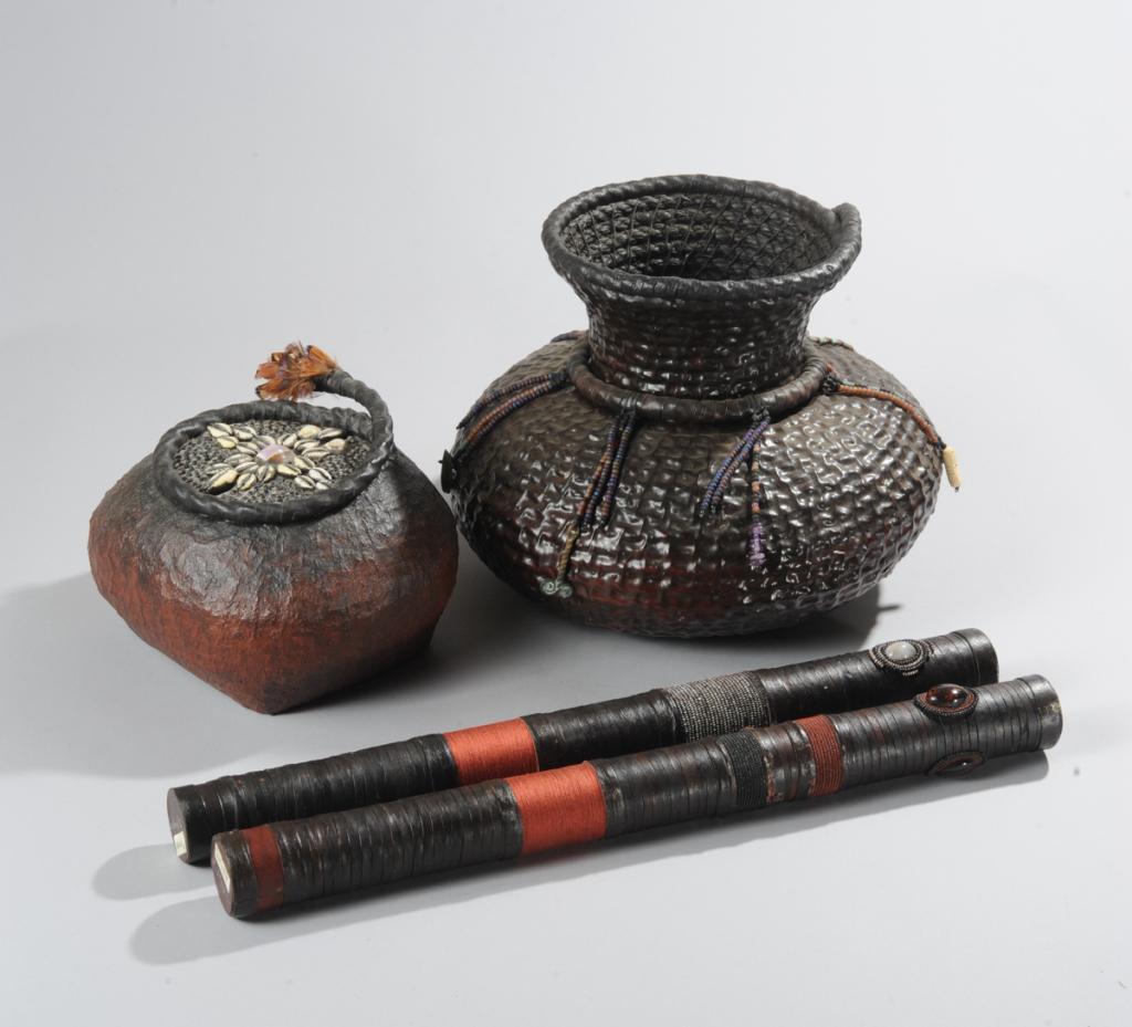 Four Works by Joel Hoyer: To include a lacquered rope basket with beads, stones and charms, a sealed lacquered basket with beads, cowries and pheasant feathers, with small holes at the base and a sound somewhere between rain a