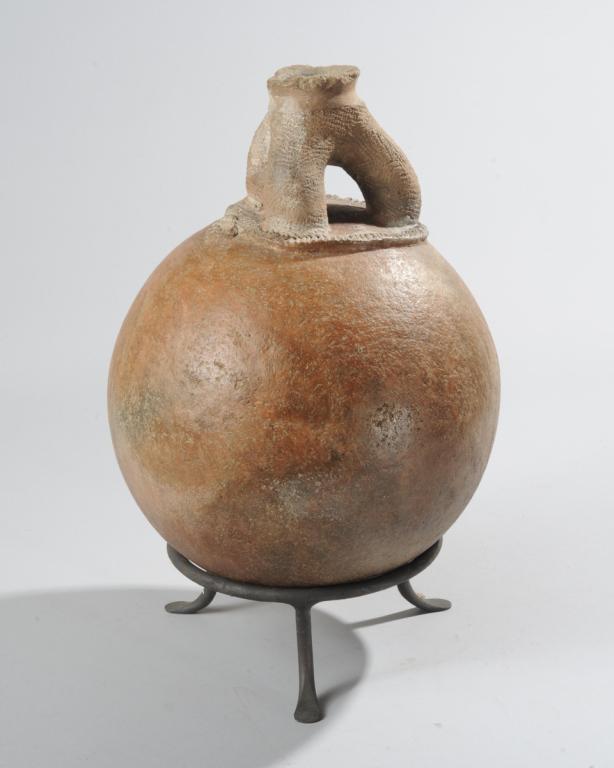 Matakam Pottery Jar, Chad: Round terracotta pot, the three gently curving necks joining in a single mouth, the neck and spout area with textured surface. Approx. 13" H, 9 1/2" D. Provenance: Estate of Thomas McNemar, (1931-2020