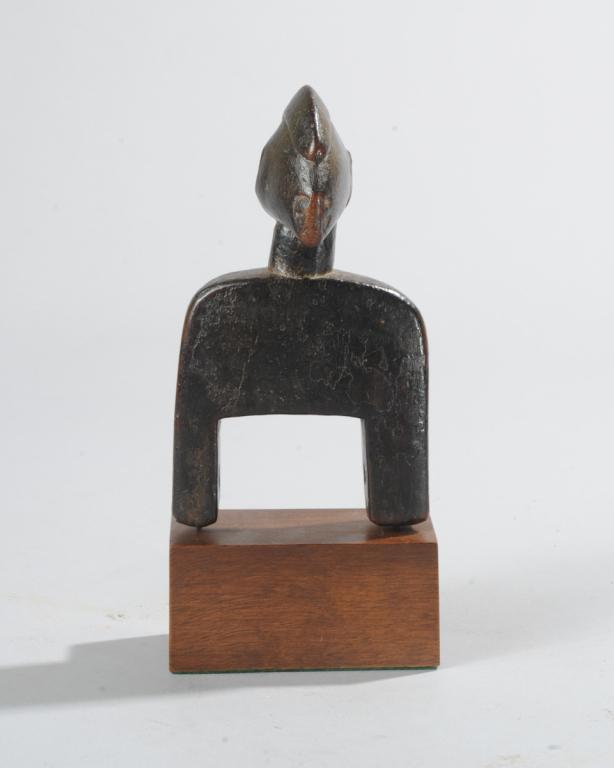 Senufo Heddle Pulley: Ivory Coast. On custom gallery stand. Total height, approx. 7". Provenance: Estate of Thomas McNemar, (1931-2020.) McNemar lived and collected throughout Central and West Africa in the 1960s and 70s.
