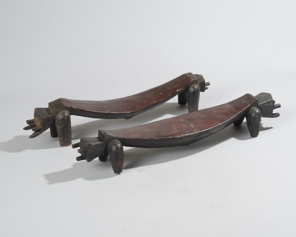 Pair African Headrests, Gabon: Of abstract animal form, the heads with various horns, tusks, projections. The larger, approx. 18" L. Provenance: Estate of Thomas McNemar, (1931-2020.) McNemar lived and collected throughout Central 