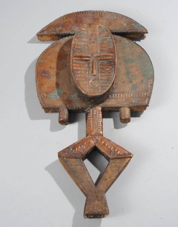 Kota Reliquary Figure, Gabon: Copper clad Kota Mbutu Ngulu reliquary guardian figure, approx. 19 3/4" H. Provenance: Estate of Thomas McNemar, (1931-2020.) McNemar lived and collected throughout Central and West Africa in the 1960