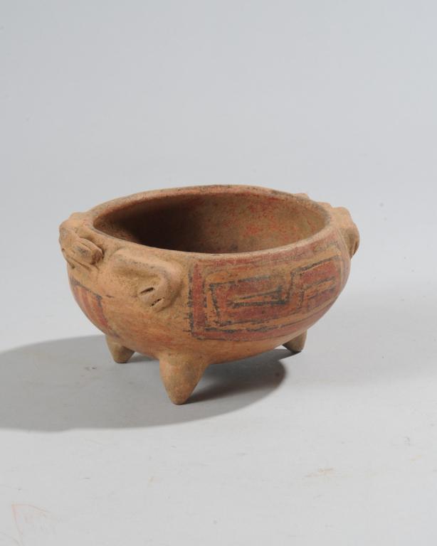 Pre Columbian Frog Effigy Bowl: Small polychrome bowl on three inverted cone legs, the head and front legs of a frog projecting from one side, the back legs projecting from the other side, with red and black geometric patterns to ex