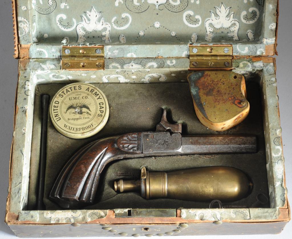 Folding Trigger French / Belgian Muff Pistol: Fitted leather case with Belgian single shot percussion "muff" pistol, Barrel with French proof mark S E E with crossed branches. Finely engraved. Approx. 2 3/4" barrel. Total length approx. 7 1/4". B