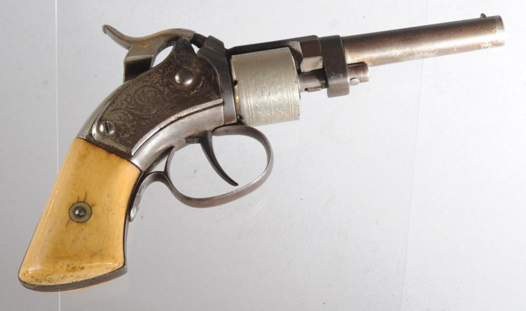 28 Caliber Maynard Prime Pocket Model Revolver: 28 Caliber. Made by Mass Arms, Chicopee Falls Mass, Maynard Prime Pocket Model Revolver. 1851-1860. 2500-3000 made. Early model, hand-revolve cylinder. Total length approx. 7". Provenance: The estate 
