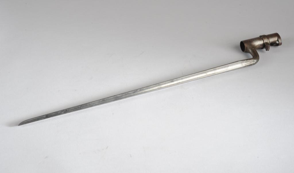 US marked socket bayonet: With retaining ring. Large caliber. Overall length approx. 21". Provenance: The estate of Fred France.