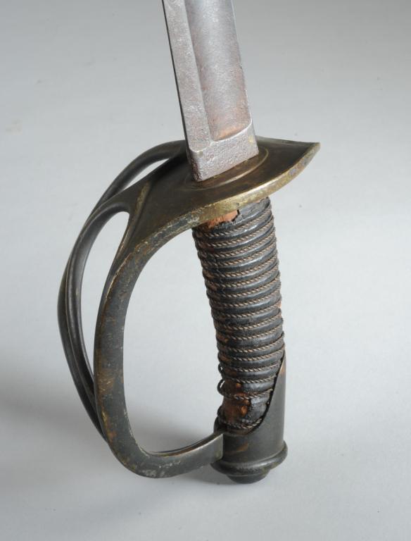 Confederate South Carolina Saber: Marked Columbia South Carolina. Grip with two wire wrap. Total length in scabbard approx. 43". Provenance: The estate of Fred France.