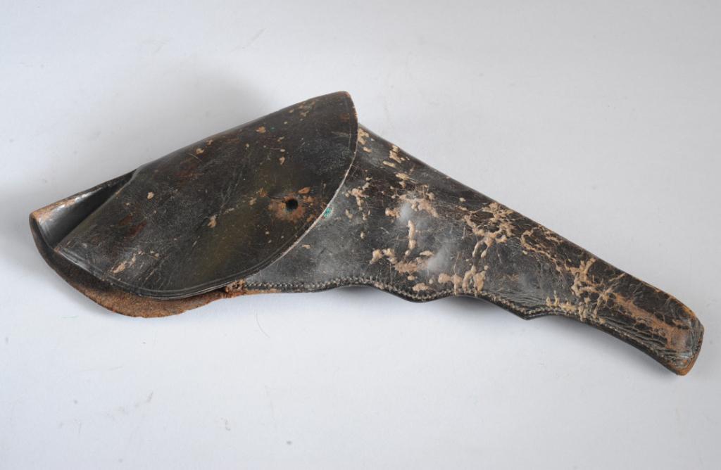Flap Holster for Early Revolver: Approx. 14" total length. Provenance: The estate of Fred France.
