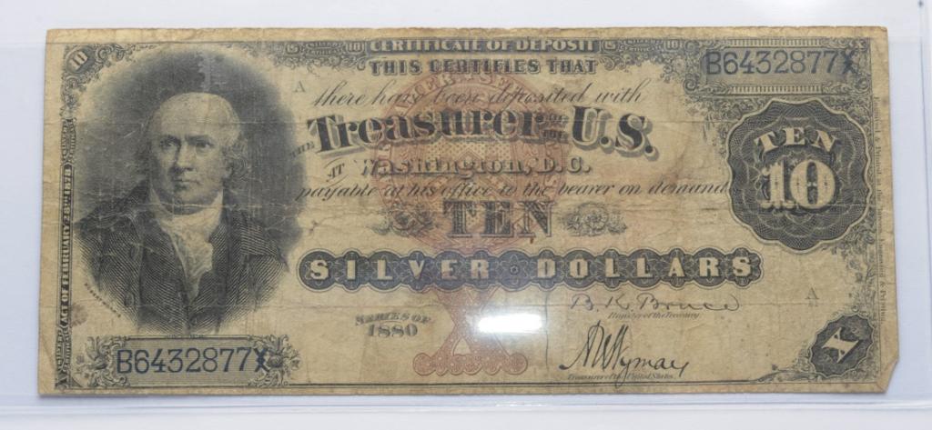 1880 Silver Certificate: With image of Robert Morris, in overall fine condition.