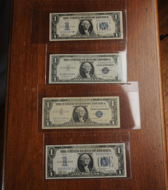 Four 1-Dollar Silver Certificates: Two 1934, one 1935, one 1957.