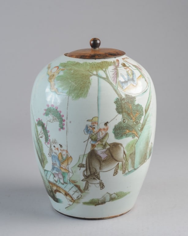 Chinese Republic Jar, Figures of Children: Early 20th C. porcelain jar with little boys in a landscape: two are conferring on a bridge, the third rides an ox. A scholar watches from a window and a farmer watches from behind a wall. Soft colors