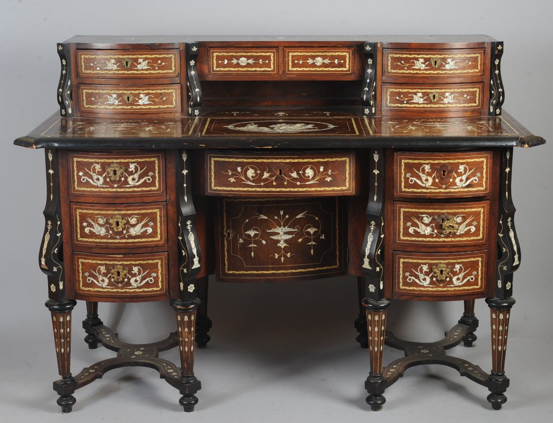 19th C. Italian Bureau Mazarin, Bone & MOP Inlay: 'Bureau Mazarin' knee hole desk with exuberant inlay decoration in bone and mother of pearl, in ebonized and natural wood, the decoration extending to the X-form stretchers and nearly all parts. Upper