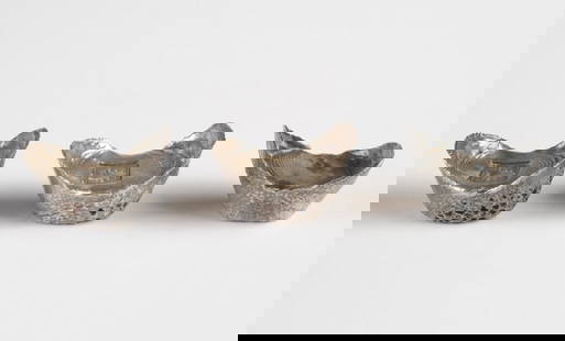 Three Chinese Silver Ingots: Three boat-shaped silver ingots or sycees, two with impressed marks, likely auspicious, meaning 'Life". One unmarked but tests silver. Total weight approx. 109.4 grams / 3.51 ozt.
