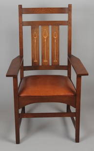 Stickley Harvey Ellis Collection Inlaid Arm Chair: Contemporary Stickley solid oak armchair with stylized floral inlay on the three back slats. Leather seat. Excellent condition. Arm approx. 25 3/4" H. Approx. 26" W x 24" D x 44" H.