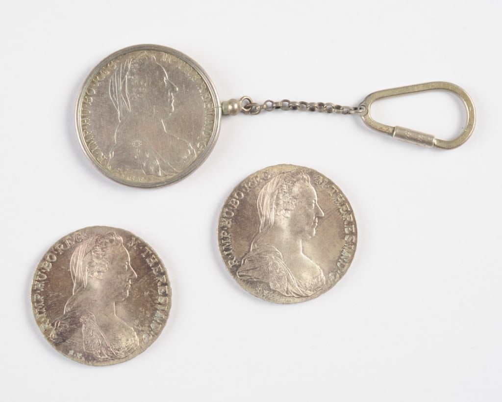 3 Re-Strike 1780 Maria Theresa Silver Thaler Coins: One mounted with chain and clip, all In as-found condition.