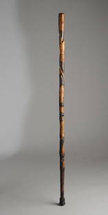 Antique American Southern Folk Art Carved Cane: Late 19th-turn of the 20th C. folk art cane, the top carved with a hand (with cuff and cufflinks) grasping the knob, and with two alligators, a toothy fish, foliage, a capering bull, and best of all,