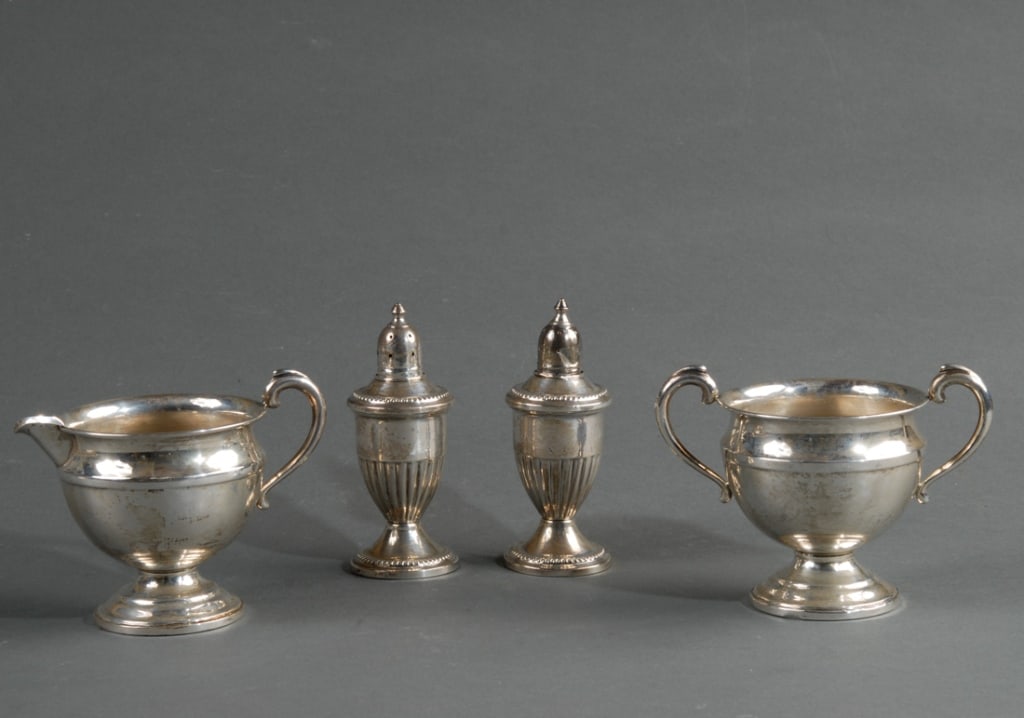Mixed Weighted Sterling Grouping: Including sugar, creamer, pair of shakers, no monograms. H: approx. 4".