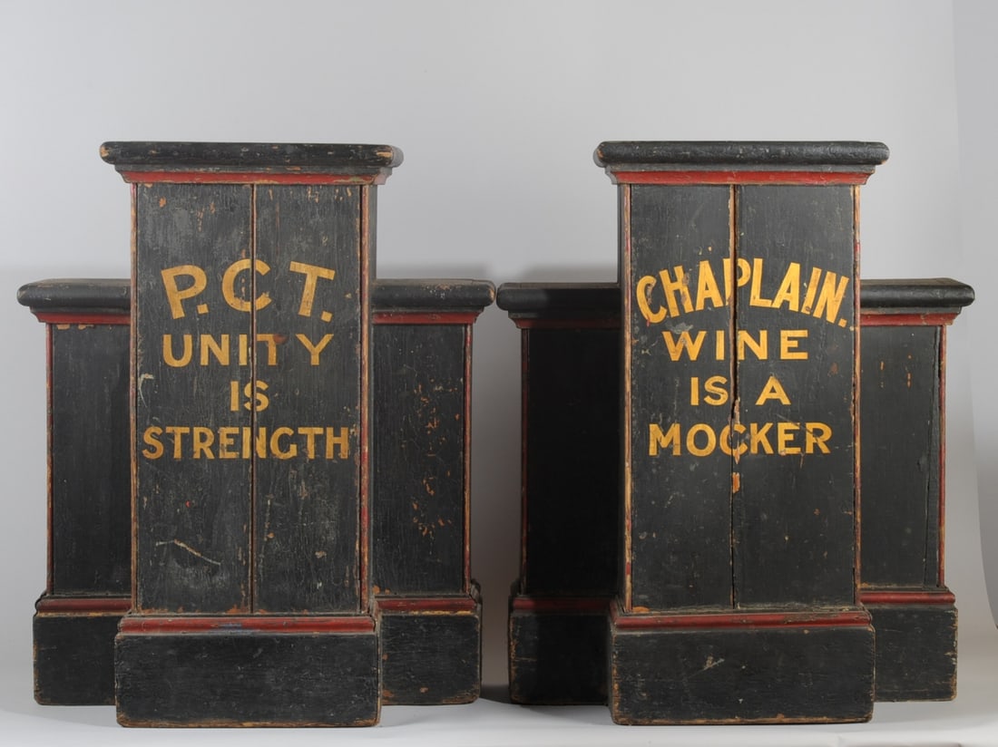 Pr. Temperance / Fraternal Plinths or Podiums: Pair of wood podiums or plinths or display stands, painted black with red trim and yellow letters, identical except for the words painted across the front: One has the word CHAPLAIN, and below it: WIN