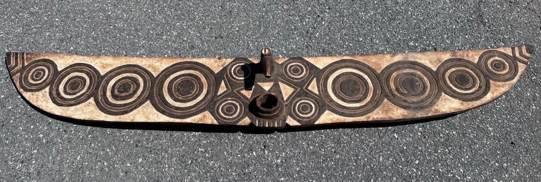 Bwa Butterfly Mask, Burkina Faso: Large carved and pigmented wood mask representing a butterfly, the broad wings marked with concentric circles on the front and a black and white checkered pattern on the back. Bwa Yehoti masks are use