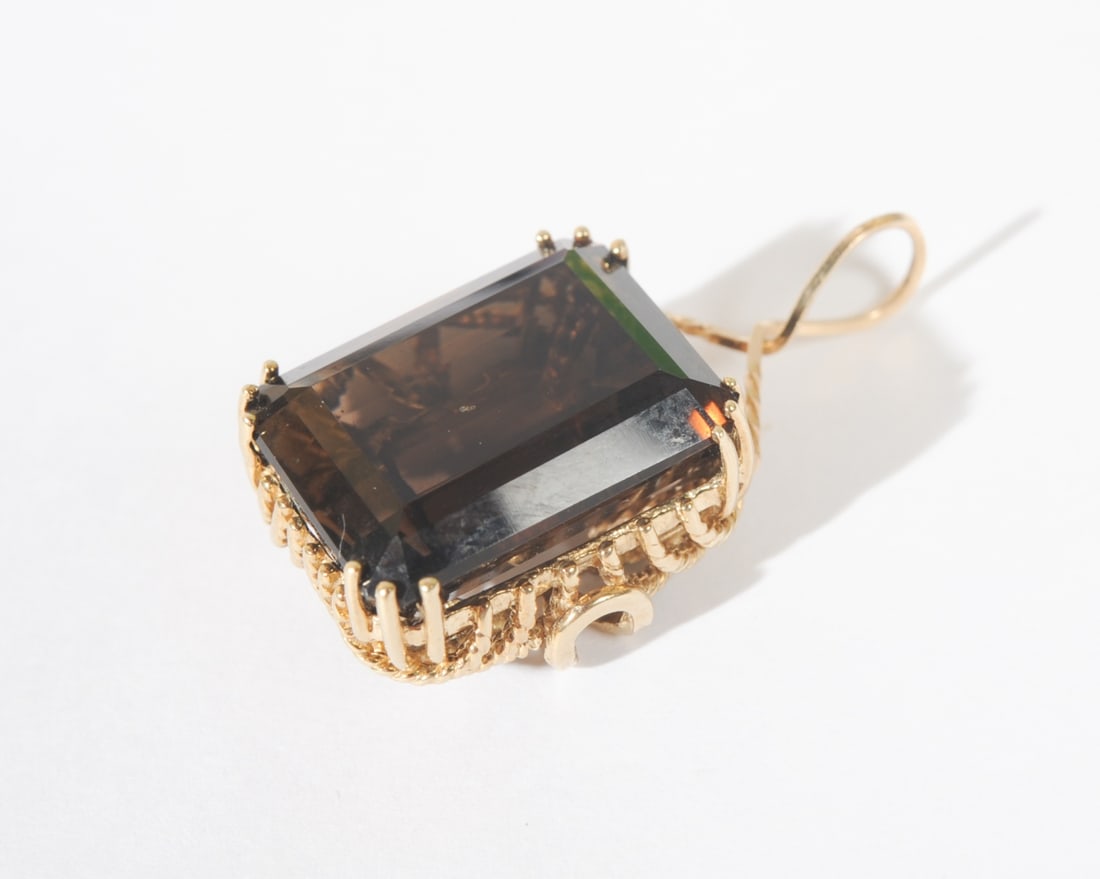 10K Gold & Smokey Quartz Pendant: Stone: approx. 7/8" x 5/8", L: approx. 1 3/8" to top of setting.