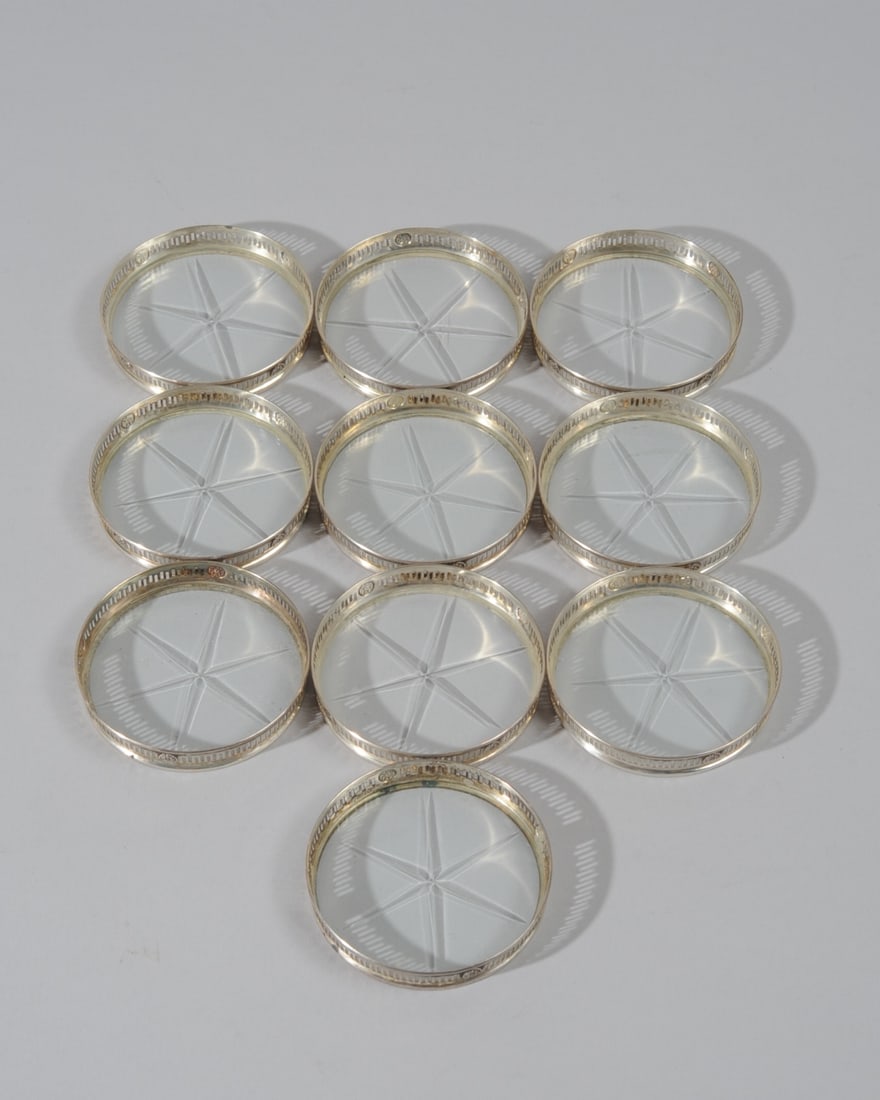10 Sterling & Glass Coasters: Marked for Webster Company, some minor scratching. Dia: approx. 2 1/2", H: approx. 3/8".