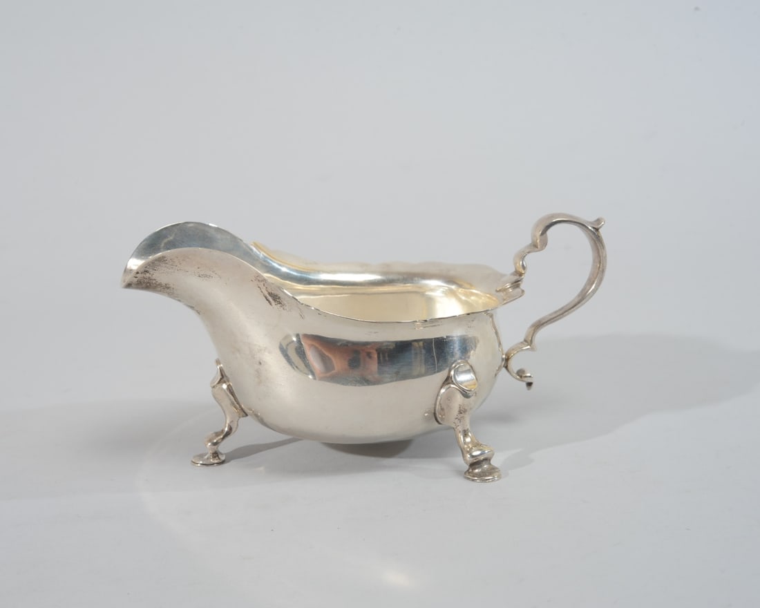 Ensko Sterling Silver Footed Sauce Boat: Marked to underside. Approx. 3 1/2" x 7 1/4" x 4 1/4". Weight: approx. 10.32 ozt.