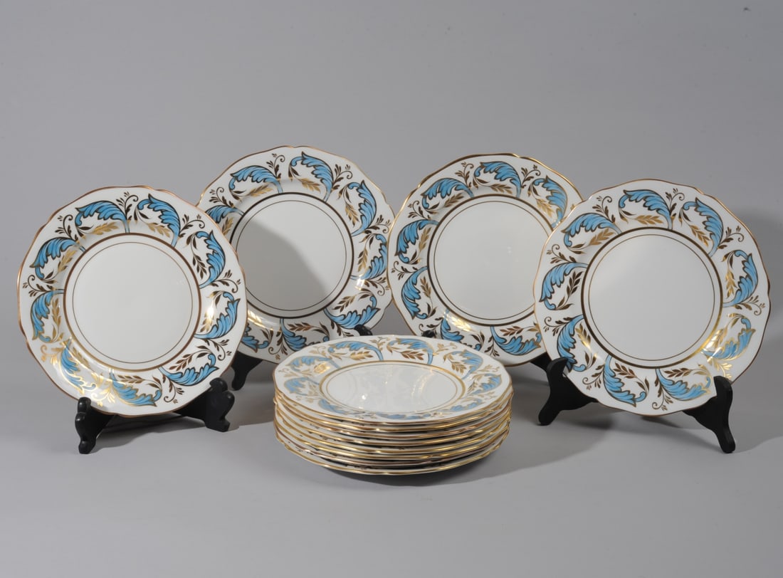 12 Tiffany & Co. Grosvenor 9" Plates, 'Avalon': Set of twelve Grosvenor bone china plates for Tiffany & Co., New York, in the 'Avalon' pattern in blue and gilt on white, with scalloped rim. All marked "Tiffany & Co. / New York. / Grosvenor / Bone C