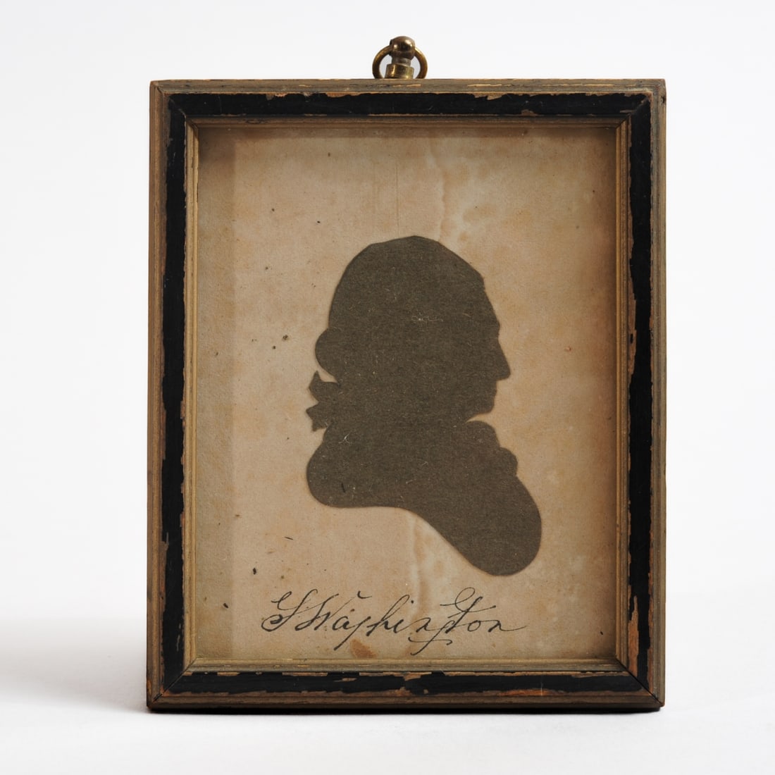Early 19th C. Cut Out Silhouette George Washington: Cut paper silhouette of George Washington, with a very good copy of his signature, the back of a small piece of what appears to be the title page for a sheet music. The writing on the scrap of wove pa