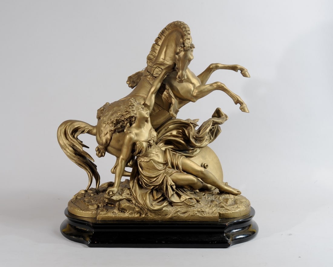 After Philippe Poitevin (French, 1831-1907): Neoclassical sculpture, possibly representing Hippolyta, showing a young woman in Grecian drapery attempting to restrain a rearing horse. With "Poitevin" impressed into base. Hollow metal material, pa