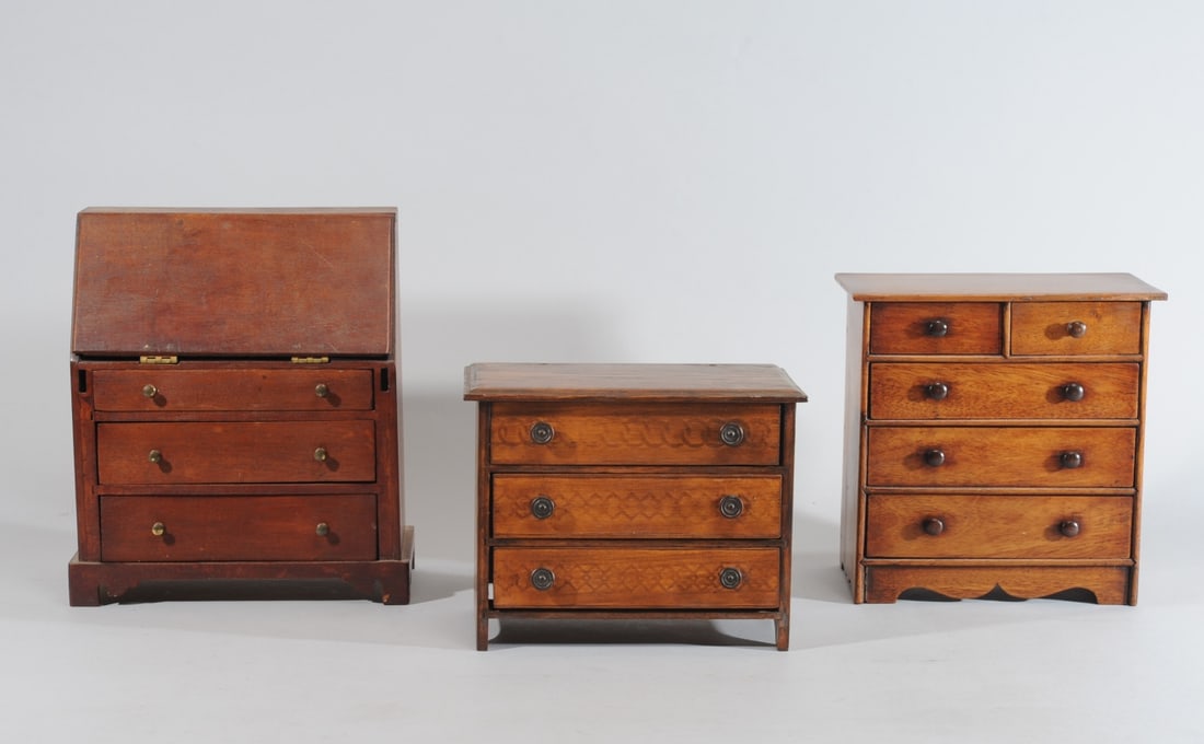Two Miniature Chests and a Slant Front Desk: Two miniature chests of drawers with no visible maker's marks, slant front desk marked to underside in pencil: "Made by A.E. Vogt 1958". Largest (slant front): approx. 10 3/4" x 9" x 5 1/8".