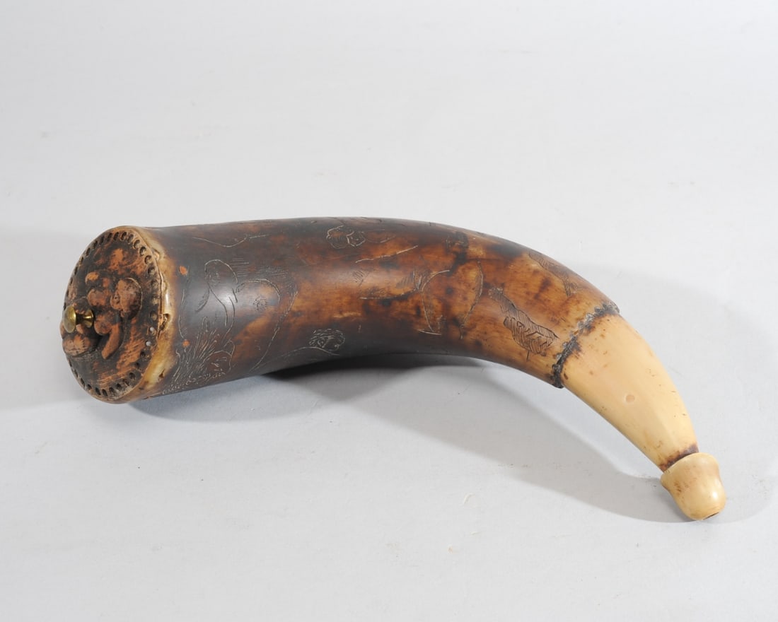Folk Art Powder Horn w/ Erotic Carving: Large antique powder horn, the sides carved with couples engaged in various sexual acts and with provocatively posed nude women, the horn tip itself carved in phallic form, the wooden end cap with a n