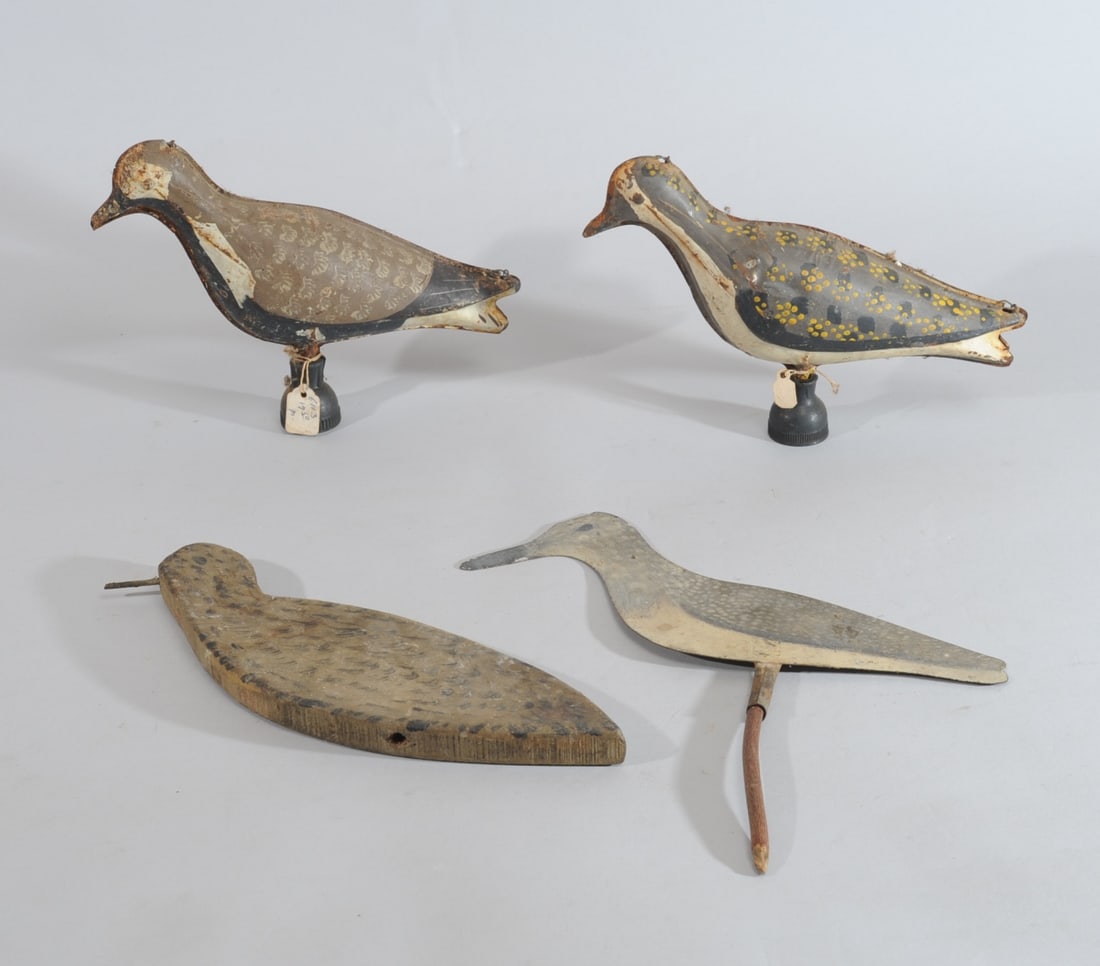 Four Painted Shorebirds: One wood, three metal, all in as-found condition. Longest: approx. 11 1/2". Provenance: the estate of John Long, highly regarded Virginia antiques dealer and collector.