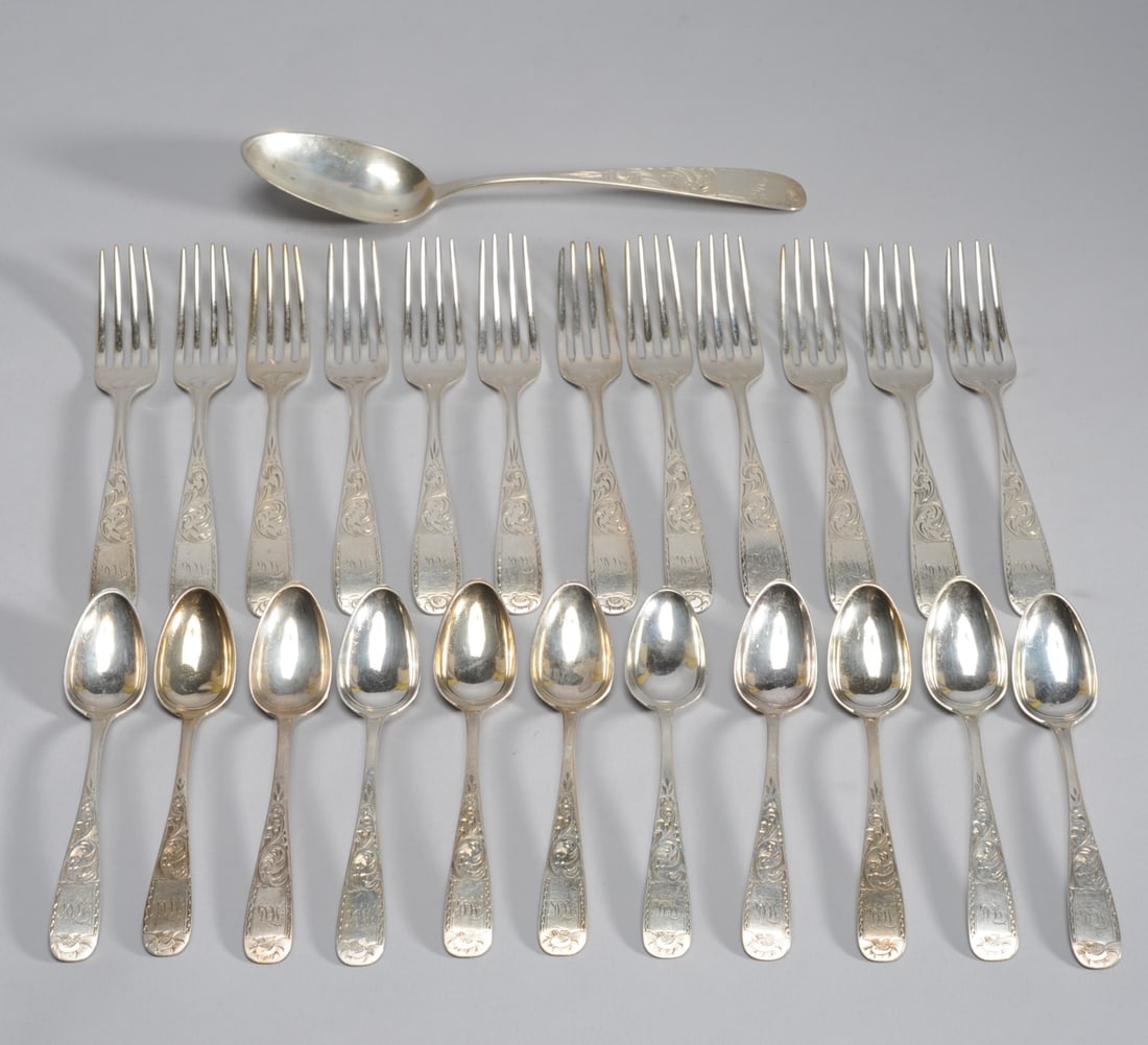 24 pcs. A.E. Warner Coin Silver Flatware: All monogrammed, including twelve forks (L: approx. 7", marked "Warner 11"), eleven spoons (L: approx. 5 3/4", marked "A.E. Warner 11") and one serving spoon (L: approx. 9", marked "Warner 11"). Total