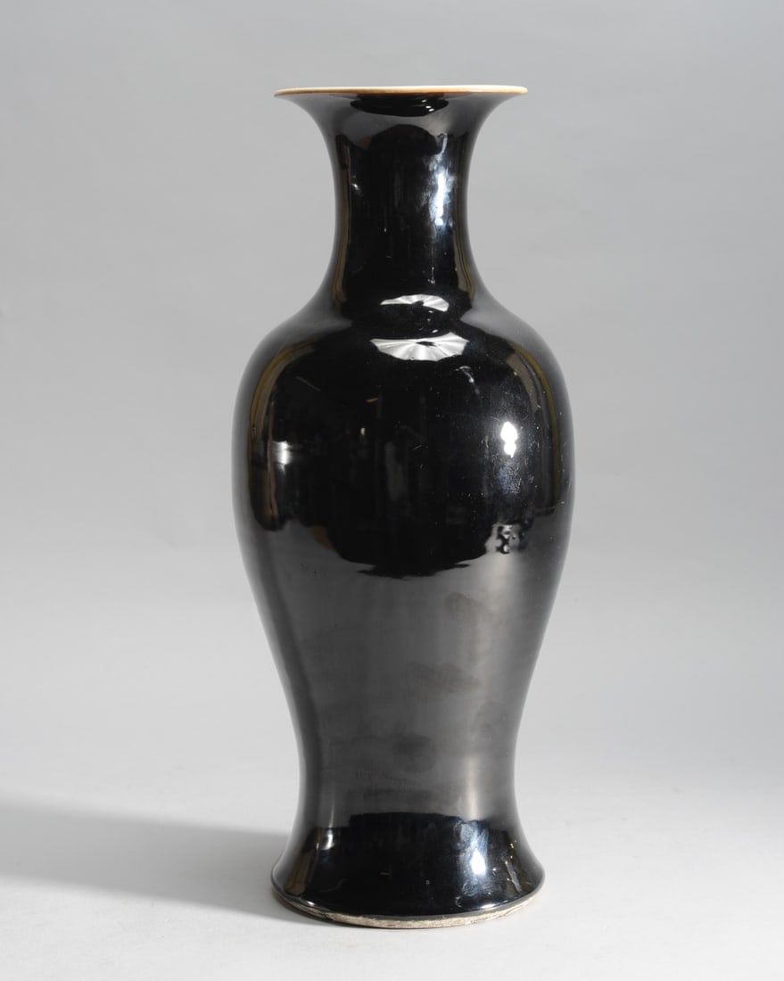 18" Chinese Mirror Black Baluster Vase: Antique Chinese vase with mirror black glaze, thinning to warm brown right at the rim, with white interior and base. Unmarked. Qing dynasty. Approx. 18" H.