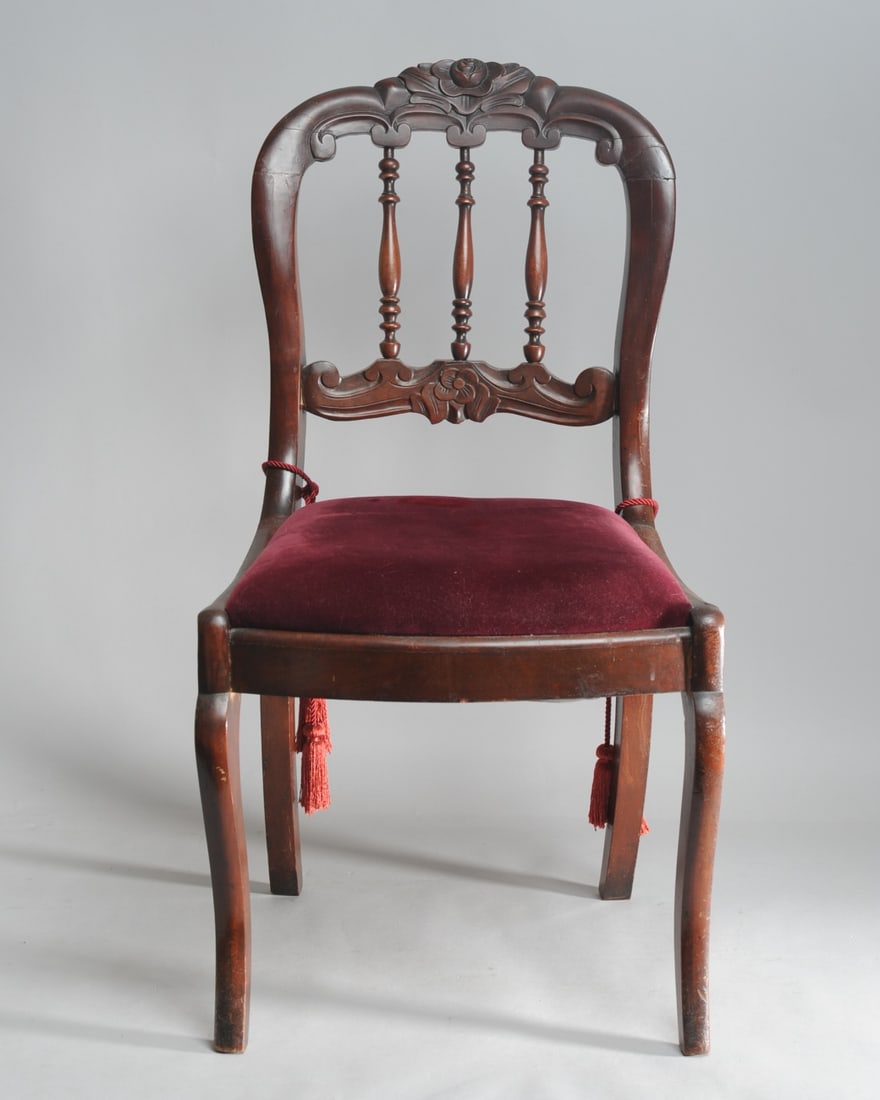 Victorian Side Chair: Floral motif to crest rail, upholstered seat, some repairs / as-found condition. H: approx. 33 1/2".
