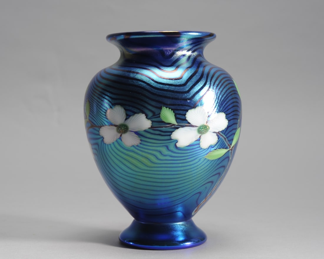 Orient & Flume Dogwood Vase Carter Sherwin: Art glass vase with dogwood blossoms over feather pulled iridescent blue ground. Etched signature to base: Carter Sherwin for artists Will Carter and Chris Sherwin. With Orient & Flume and numerical m
