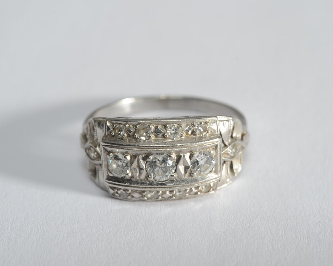 Vintage Platinum 0.25 cts Diamond Cocktail Ring: Size 8 1/2. Total weight: approx. 5.0 grams.