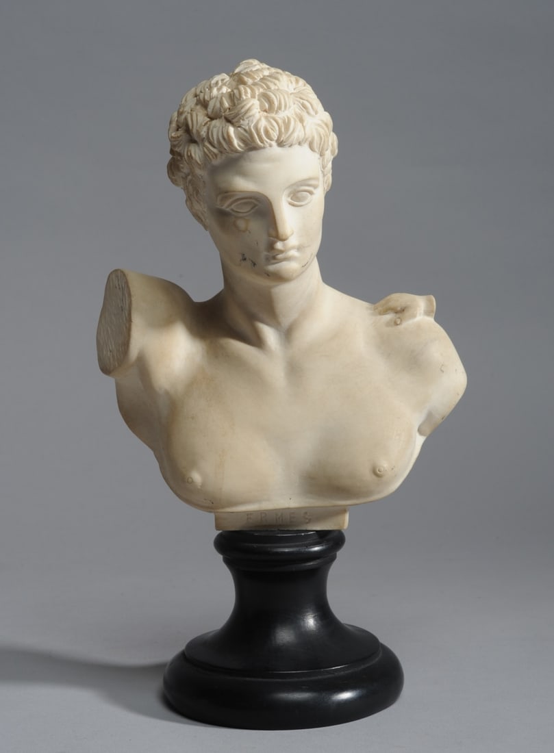 Vintage Parian Hermes Bust: Small parian bust of the Greek deity Hermes, with infant's hand on his shoulder. Ebonized composition stand. Approx. 10" H.