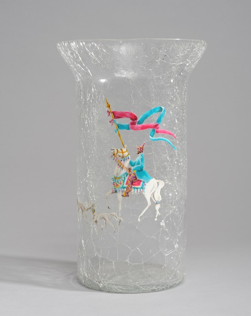 Signed Crackle Glass Vase: Crackle glass vase with painted image of a rider on horseback carrying a banner lead by two dogs, signed and dated "YR. 2000 / DOT. HAMILTON", minor chip to interior of rim. H: approx. 8". Dia: approx