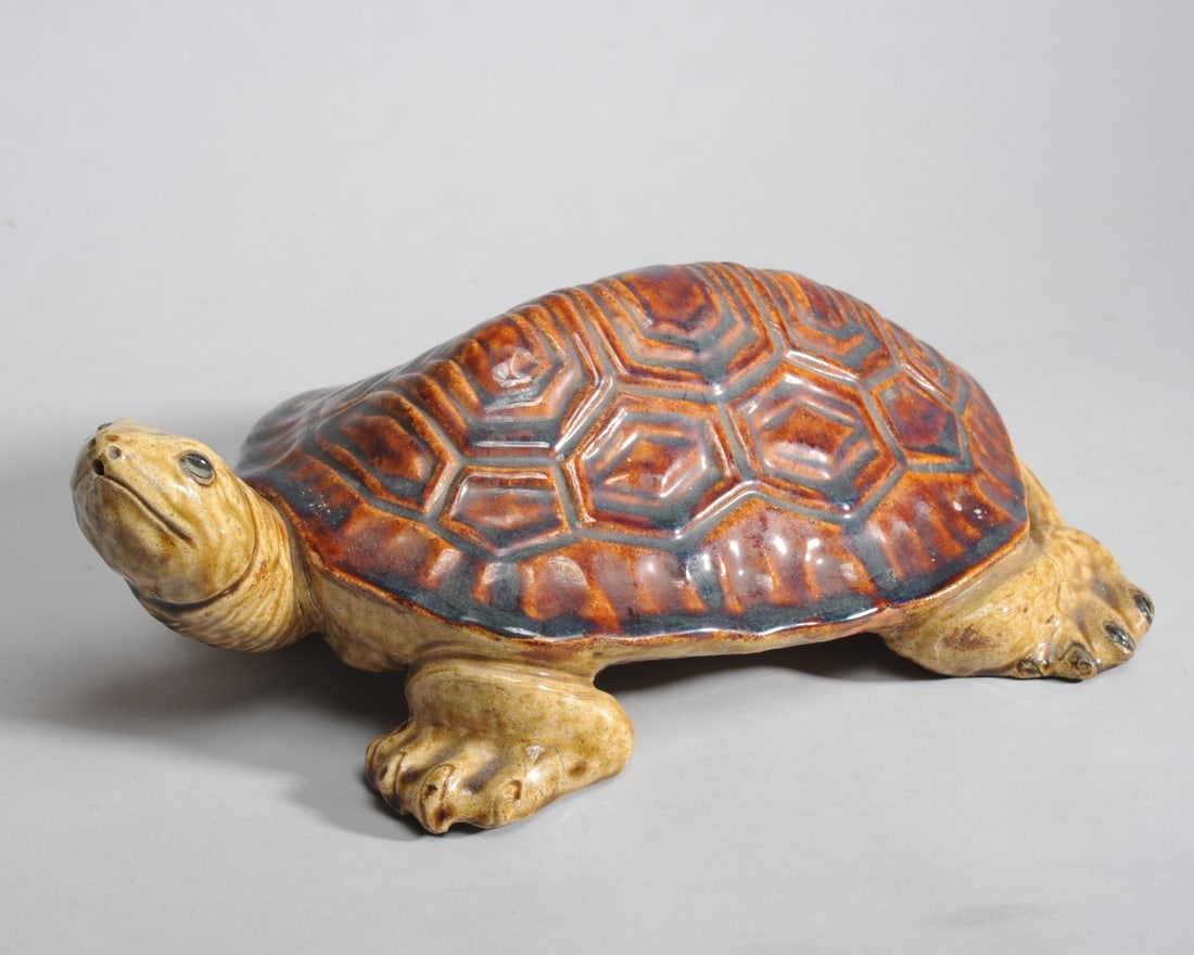 Glazed Pottery Turtle: Good drippy glaze, appears skillfully handmade. Possibly Japanese. No mark or signature found. Approx. 15" L x 11 1/4" W x 6" H. Provenance: the estate of John Long, highly regarded Virginia antiques 