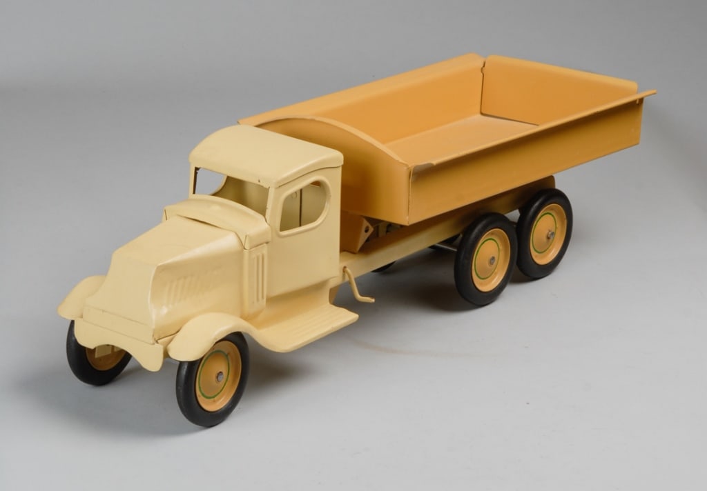 Turner Toys Pressed Steel 6-Wheel Dump Truck: Circa 1930, repainted / in as-found condition. Approx. 25" x 8 3/4" x 8".