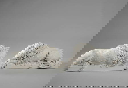 Canova Lions Pair, English Cast Stone: After the original pair showing a sleeping and a crouching lion, by Antonio Canova (1757-1822) made for the tomb of Clement XIII at St. Peter's, Rome. According to label to underside of base, "These r