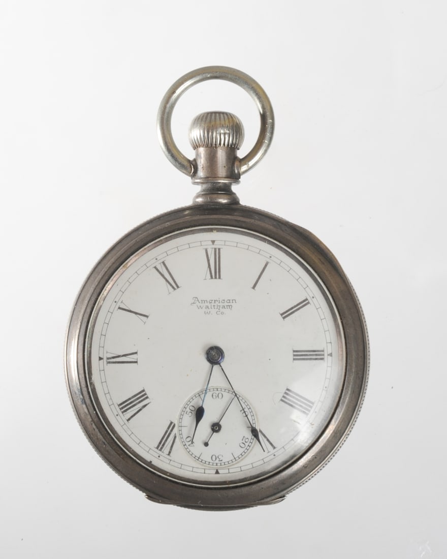 American Waltham Pocket Watch in Coin Silver Case: Case marked coin, movement marked with serial number 4223761, untested and in as-found condition. Dia: approx. 2", approx. 2 1/2" from winder to bottom.